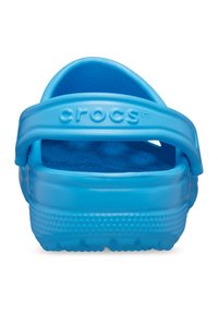 Crocs blu con una cintura flessibile, dotati di una soletta strutturata e di una suola rigata per una migliore aderenza. Realizzati in materiale sintetico leggero.
