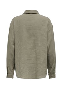 Langarmshirt van gestructureerde olijfgroene stof, met een kraag en knoopmanchetten, een losse pasvorm en een detail met een ruginzet.