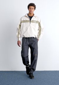 Ellesse DE ROSSI - Poletna jakna - beige