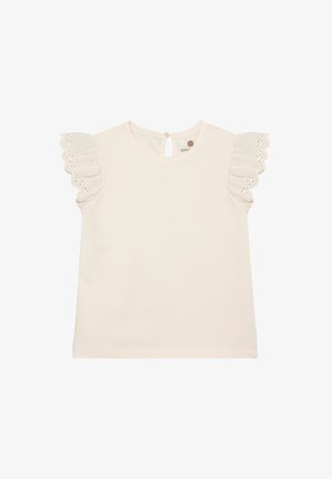 Top color crema con mangas con volantes que presentan detalles de ojales. Cuello redondo y una abertura en forma de ojo de cerradura en la parte trasera, hecho de tela de algodón suave.