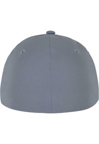 Gray cap with a rounded shape, made from textured fabric, featuring a stitched button at the top and ventilation eyelets on the sides.