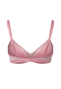 Pink bra with a blend of sheer and opaque fabric, featuring a triangular shape, adjustable straps, and a branded elastic band.