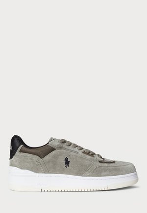 Gray suede sneaker featuring a textured upper, contrasting black heel, white sole, and embroidered logo. Lace-up design with six eyelets.