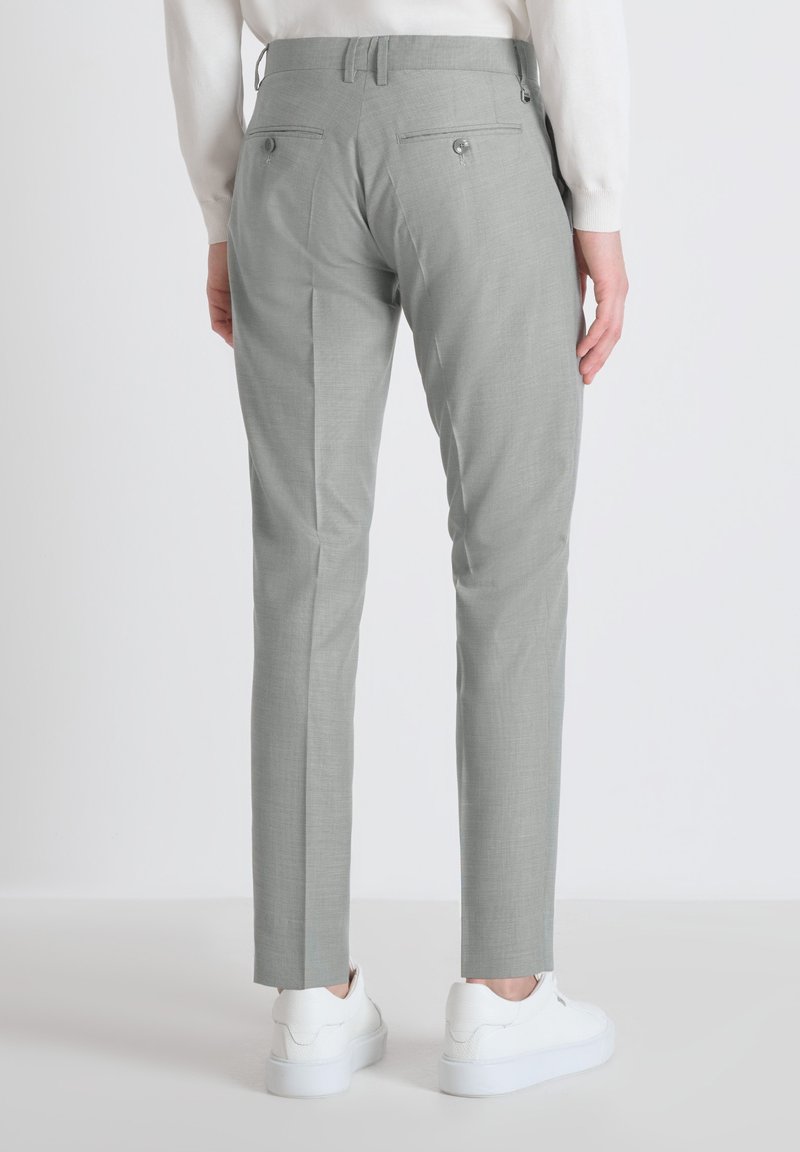 Tearaway Pantaloni Mizuno Con Bottoni Laterali Zalando Pantaloni