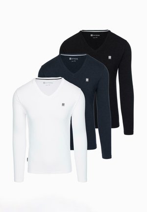 - Bluzka z długim rękawem