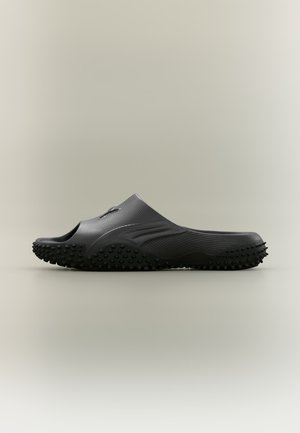 Puma MOSTRO SLIDE UNISEX - Badesandale - black