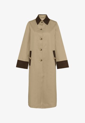 Beige trenchcoat med brun manchestkrage och manschetter, med sex knappar och två sidfickor med matchande tygdetaljer.