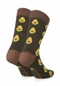 Brązowe skarpetki z powtarzającym się wzorem avocado w odcieniach zieleni i żółci, z pomarańczowym akcentem na podeszwie. Miękka tekstura i design w długości do kostki.