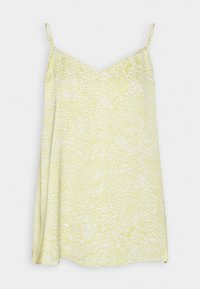 Robe nuisette sans manches jaune et blanche avec fines bretelles et motif abstrait ondulé sur un fond uni.