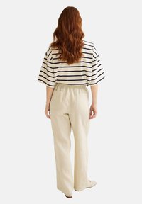 Monoprix TAILLE SEMI-ÉLASTIQUÉE UNI EN  - Pantalon classique - shantung