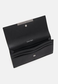 Calvin Klein LINEAR LARGE TRIFOLD SLIM - Portefeuille - black