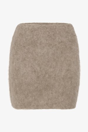Vaalean beige villasekoitteinen hame, jossa on pehmeä ja pörröinen tekstuuri, suora silhouette ja leveä, pehmeä vyötärönauha ylhäällä.