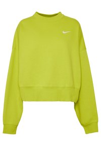 Kortad sweatshirt i klart limegrön tyg, med hög hals och långa ärmar. Vit Nike-logotyp på vänster bröst.