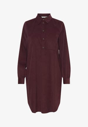 Bordo särgidress, millel on nööpidega krae, pikad varrukad ja üks rinnatasku. Valmistatud tekstureeritud kangast, mis on mugava lõikega.