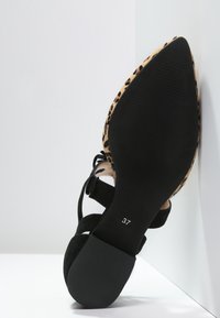 KIOMI Babies - black