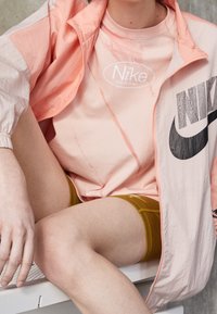 Nike Sportswear Větrovka - orange