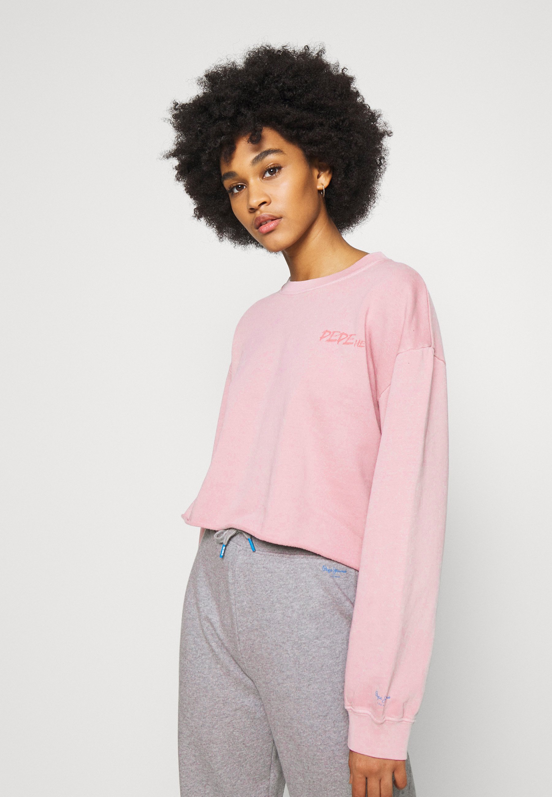 nude pink sweatshirt