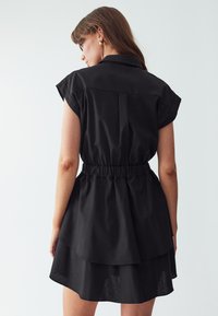 WILLA SIRENA MINI - Shirt dress - black