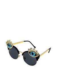 Occhiali da sole rotondi neri con braccia dorate, caratterizzati da motivi decorativi a forma di occhio impreziositi con accenti blu e strass sulla parte superiore.