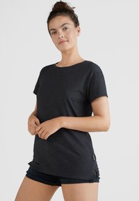 Dark gray, short-sleeved t-shirt with a round neckline, made from soft fabric. Features a slight side slit and a small tag detail at the hem.