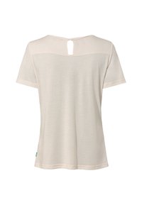 T-shirt a maniche corte di un leggero beige, con dettagli a chiave sulla parte posteriore e una vestibilità rilassata. Tessuto morbido, superficie liscia e orlo curvo.