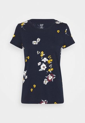 T-shirt bleu marine à manches courtes avec col rond et imprimé floral blanc, jaune et bordeaux éparpillé.