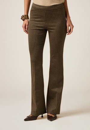 Pantalones - oro