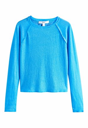 Bluza albastră cu mâneci lungi, realizată dintr-un material moale și ușor. Are un decolteu rotund și mâneci raglan, cu o croială lejeră.