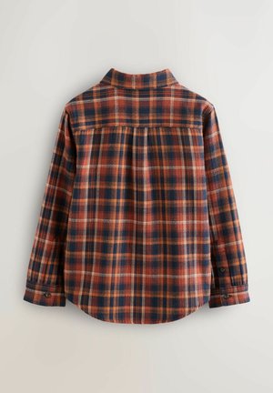 Checkered flannel shirt featuring a red, navy, and orange pattern, with long sleeves, a collar, and button cuffs, textured fabric.