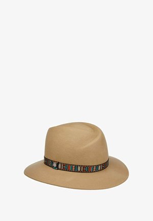 Beige felt fedora hat with a wide brim and a decorative band featuring a colorful geometric pattern.