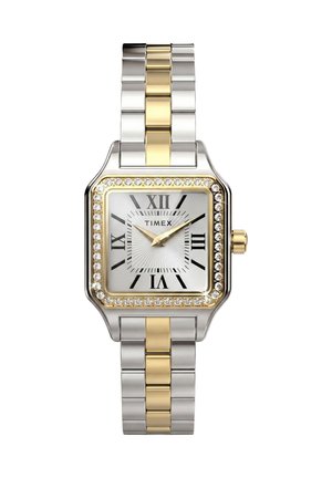 Montre-bracelet carrée argent et or Timex avec chiffres romains, aiguilles dorées, lunette ornée de cristaux et bracelet métallique bicolore.