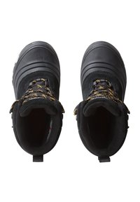 Black waterproof boots featuring textured upper, round toe, padded collar, and gold speckled laces. Sturdy rubber sole with grip pattern.
