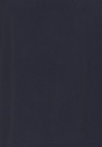 Haut bleu marine en tissu lisse, présentant un design simple sans motifs, coutures ni ornements visibles.