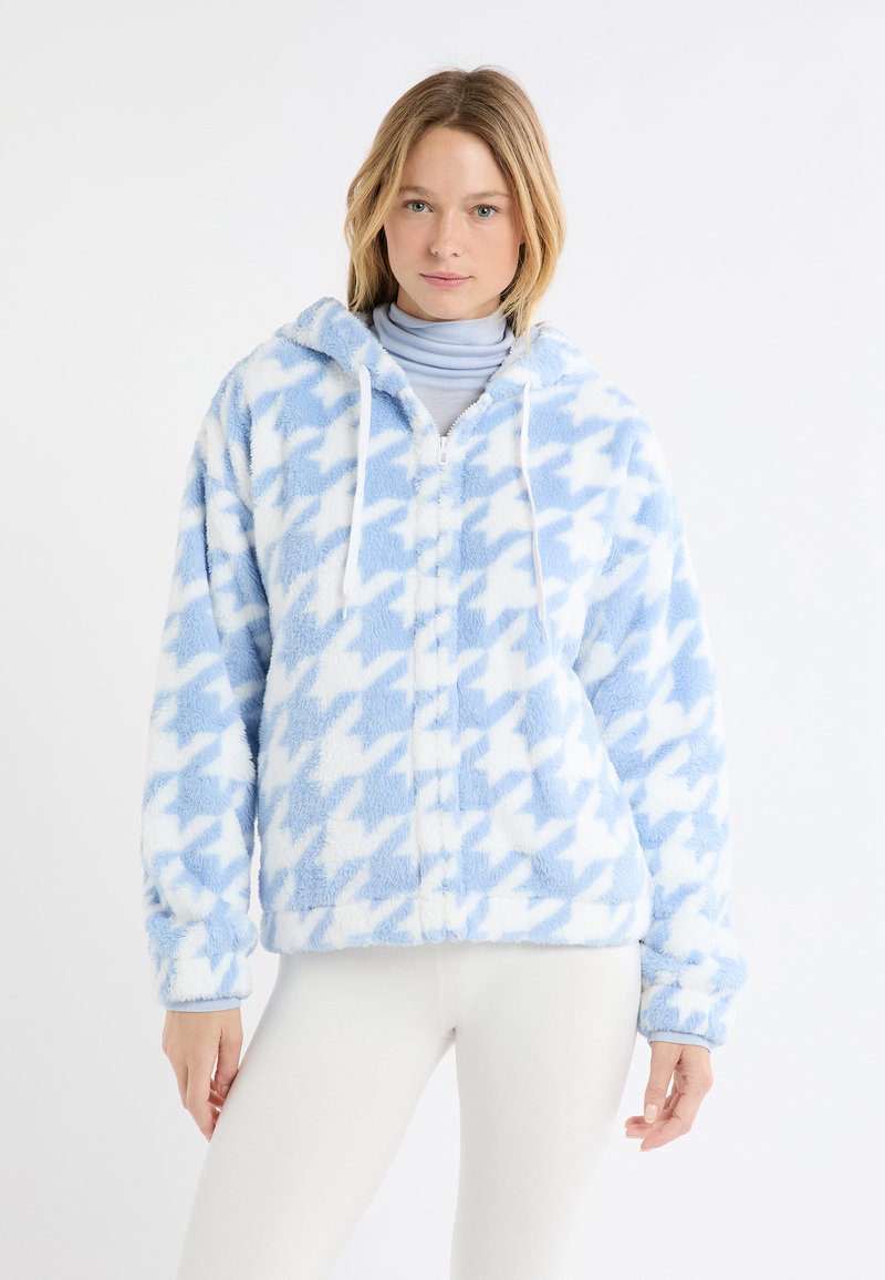 Miękka niebieska kurtka z kapturem, zdobiona białym wzorem w pepitkę, z frontowym zamkiem błyskawicznym i sznurkiem. Miękka w dotyku i o luźnym kroju.