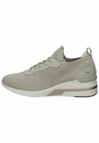 Scarpa sportiva beige chiaro con tomaia in maglia testurizzata, lacci e una suola intermedia bianca imbottita. Presenta un logo discreto sull'accento del tallone.