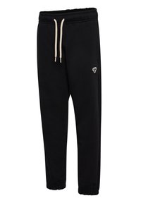 Sorte joggingbukser med elastisk talje og manchetter, hvide snore og en lille hvid logo på venstre lår.