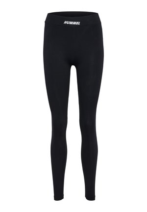 Schwarze Leggings aus dehnbarem Stoff, mit einem breiten Bund, auf dem das weiße Logo "HUMMEL" auf der Vorderseite prangt. Glatte Textur, full-length Passform.