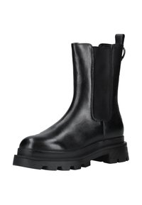 Botas Chelsea de cuero negro con paneles elásticos en los lados, suela de goma gruesa y una lengüeta en el talón para ponérselas con facilidad. Textura suave.