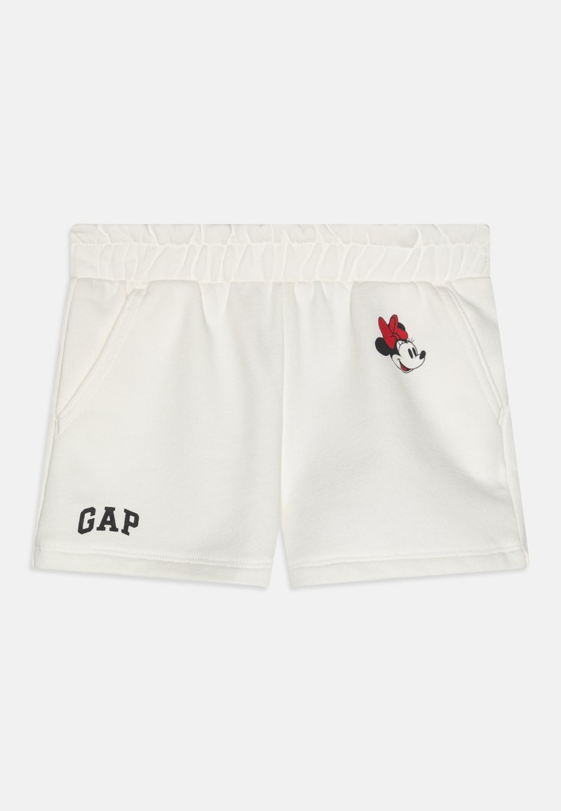 Calções brancos de algodão com uma textura macia, cintura elástica e bolsos laterais. Inclui um gráfico de laço vermelho e o logótipo "GAP" em preto.