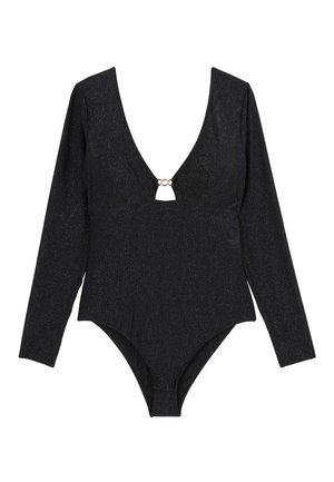 Maillot de bain noir à manches longues avec un décolleté en V profond et un accent circulaire doré au niveau de la poitrine, présentant une texture métallique et un design ajusté.