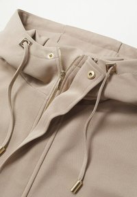 Mango Jersey con capucha - sand