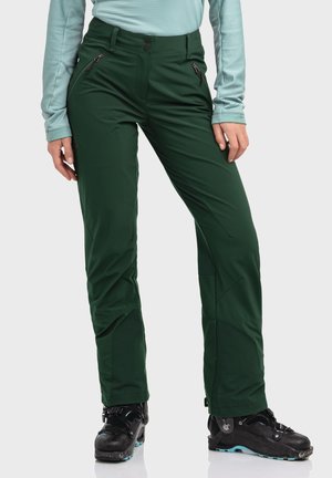 Green, waterproof ski pants with a fitted design, featuring zippered pockets and reinforced knees. Made from durable, stretch fabric.