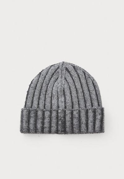 Knit beanie in gray and black stripes. Features ribbed texture and a rolled cuff. Soft fabric, rounded top, and seamless design.