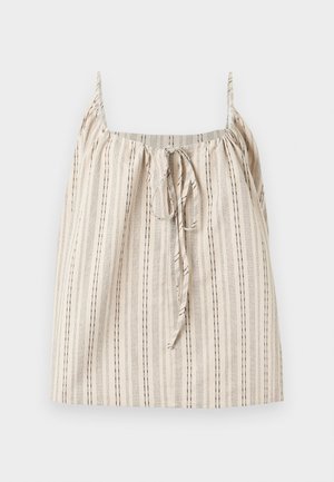 Bež top bez rukava s tankim crnim vertikalnim prugama i prednjim vezanjem u kvadratnom dekolteu, prikazan na svijetloj pozadini.