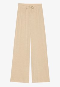 Μπεζ παντελόνια σε φαρδύ σχέδιο από μαλακό ύφασμα με ζωνάκι ρυθμιζόμενης μέτρησης και διακριτική ριμπ υφή. Διαθέτουν χαλαρή γραμμή και σχεδίαση που αγγίζει το έδαφος.