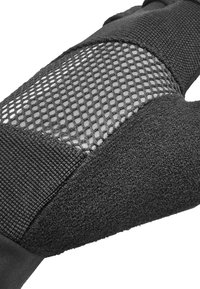 Black glove featuring textured material, mesh detail, and elastic accents, designed for flexibility and breathability.