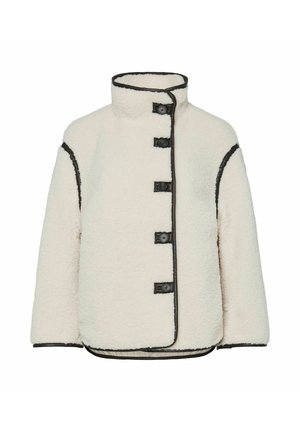 Krämfärgad fleecetröja med hög krage, fem svarta knappar och svart kantband längs kanterna. Fyrkantig design, mjuk textur.