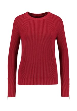 Red ribbed knit sweater with long sleeves, round neckline, and silver zippers at the cuffs.