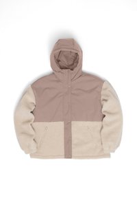 Tan and beige jacket with a hood. Top half in smooth fabric, bottom in fluffy texture. Features snap closures and side pockets.