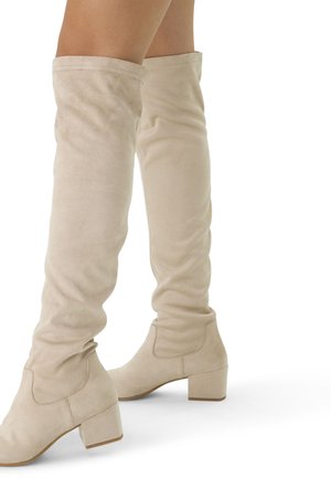 Beige kniehoge laarzen van suede met een gladde textuur, blokhak en een gevouwen bovenkant.